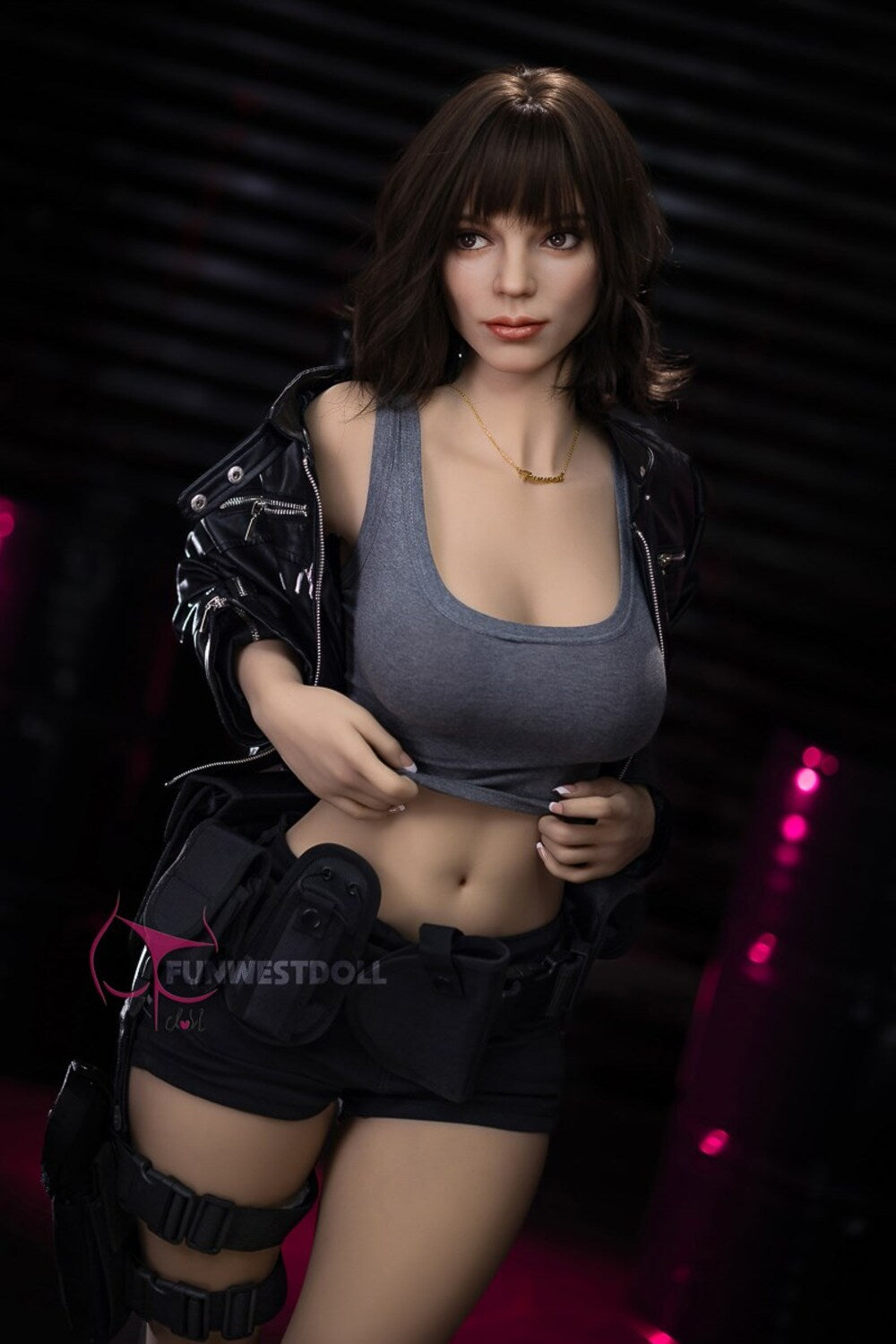 Eve by FunWest Dolls, gray cropped tank and black jacket against a dark backdrop