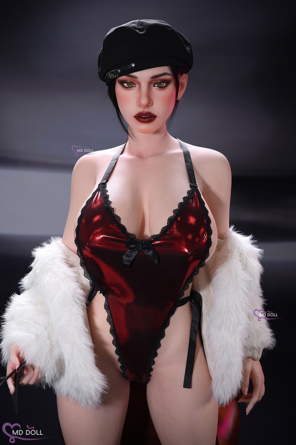 MD Doll Leona standing in a red-and-black outfit and white wrap