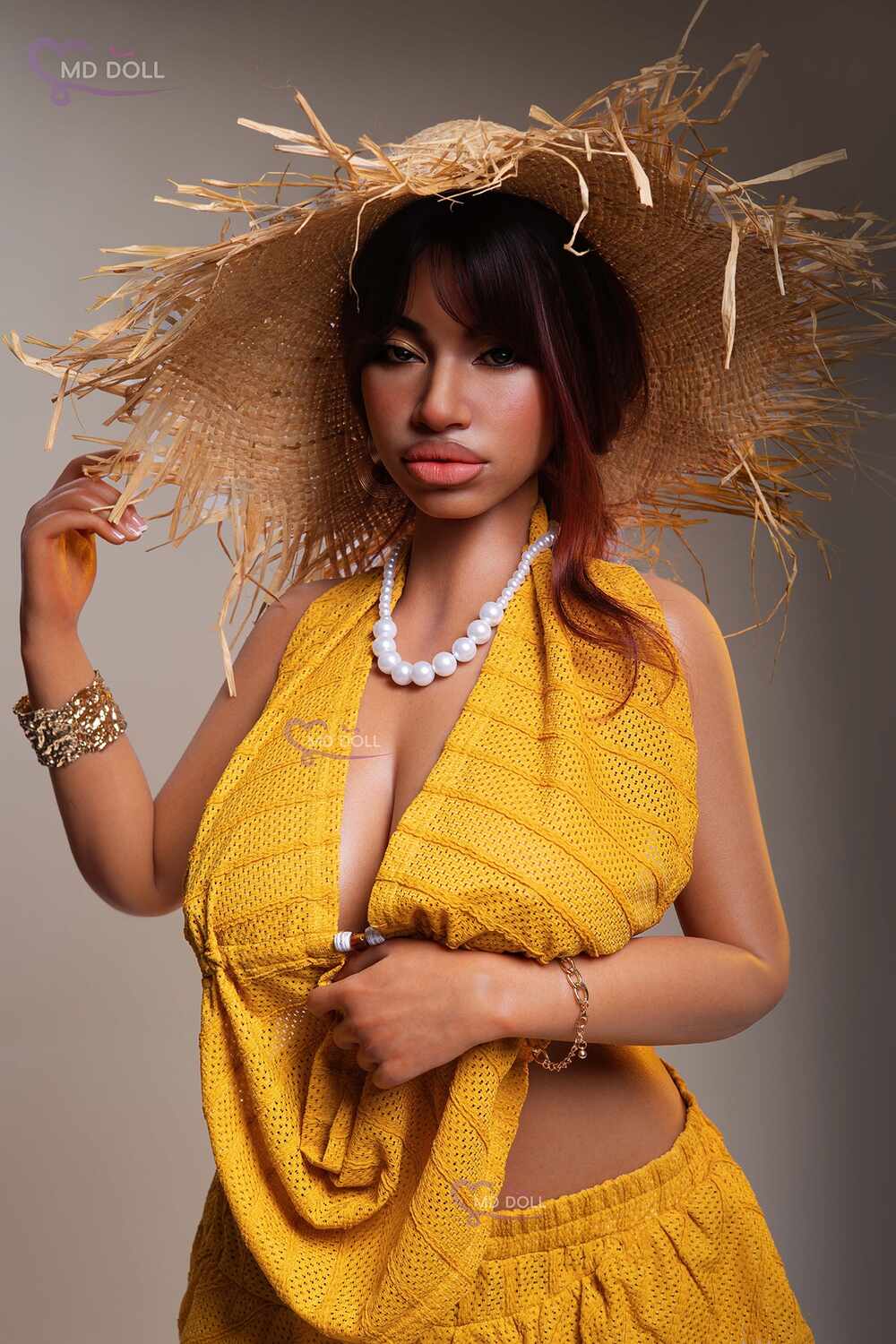 MD Doll Luna wearing a straw hat and yellow outfit